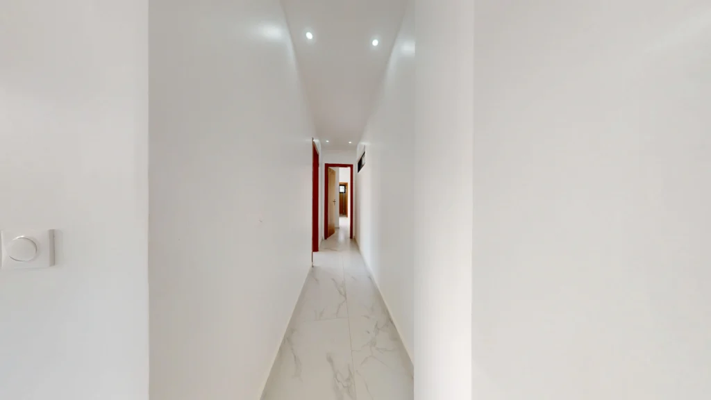 Africa-Real-Estate-Residence-Fifa-Olympic-F3-1er-etage-couloir-vers-les-chambres
